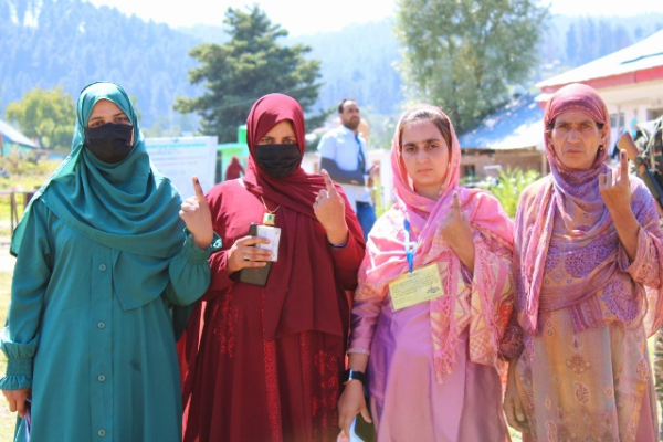 Youth and First time Voters posing at Polling stations of #Shopian after exercising their franchise